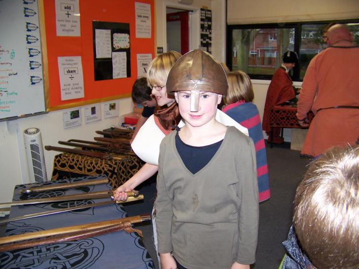 child in a Saxon helmet
